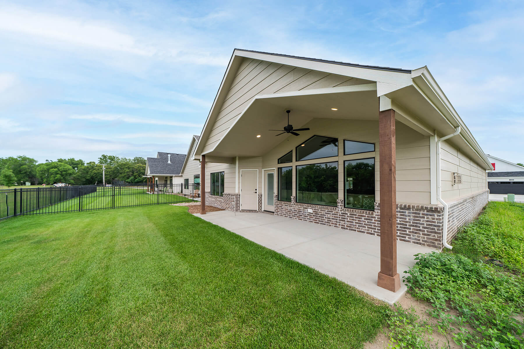 A large ground-level covered patio.